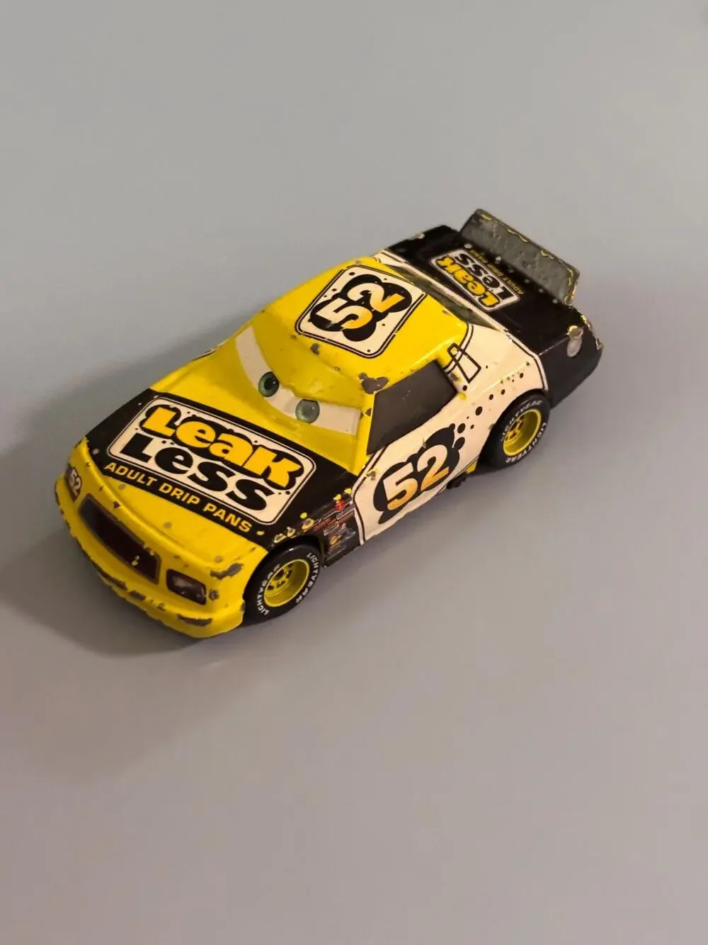 Disney Pixar Cars Claude Scruggs #52 Leak Less Yellow Die-Cast Vehicle